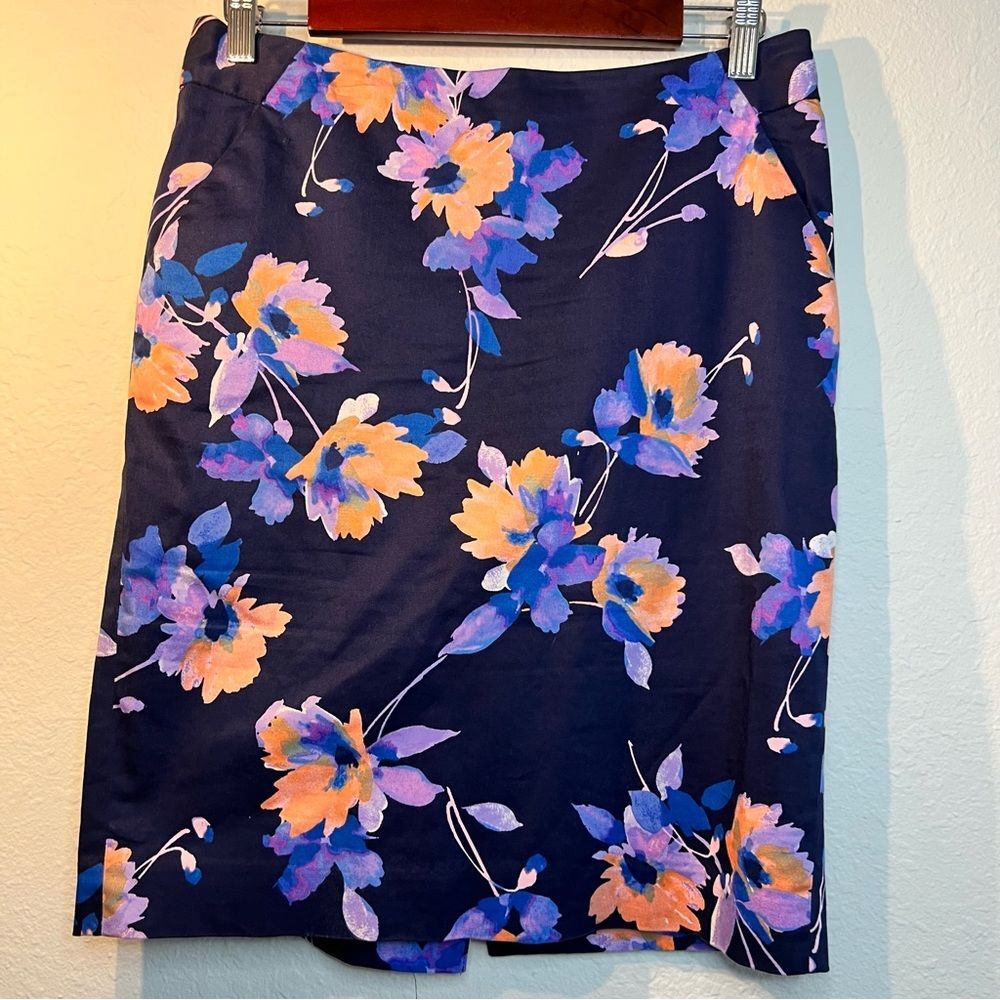 The limited, navy blue and floral pencil skirt. Pockets size 6.